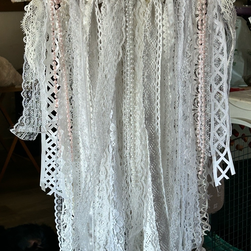 This is wall hanging. Made out of lace, pearls, & birch branch. - Picture 3 of 3